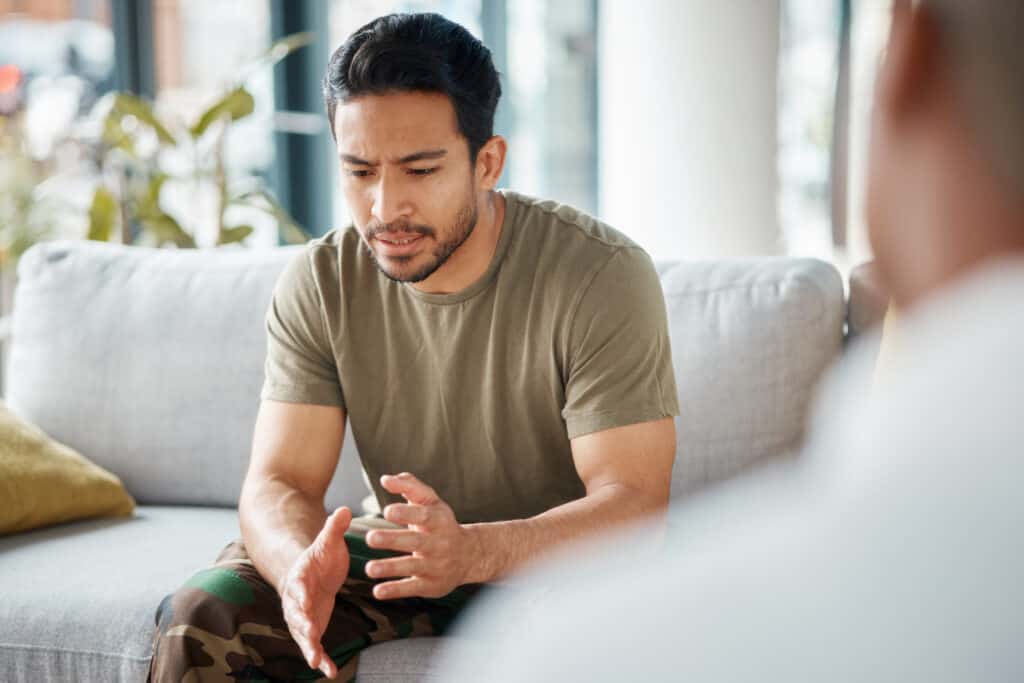 ptsd soldier and man in therapy for trauma counseling due to military war and talking army mental